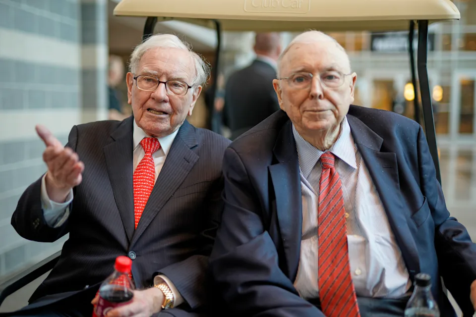 Warren Buffett and Charlie Munger sitting together.